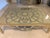 Super adorable beige and silver coffee table..This glass covered table has a unique flower design in the middle.. 2 years...