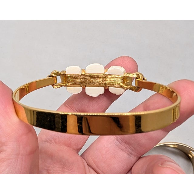 Vintage Signed Crown Trifari Goldtone Carved Faux-Ivory Cuff Bracelet For Sale - Image 9 of 12