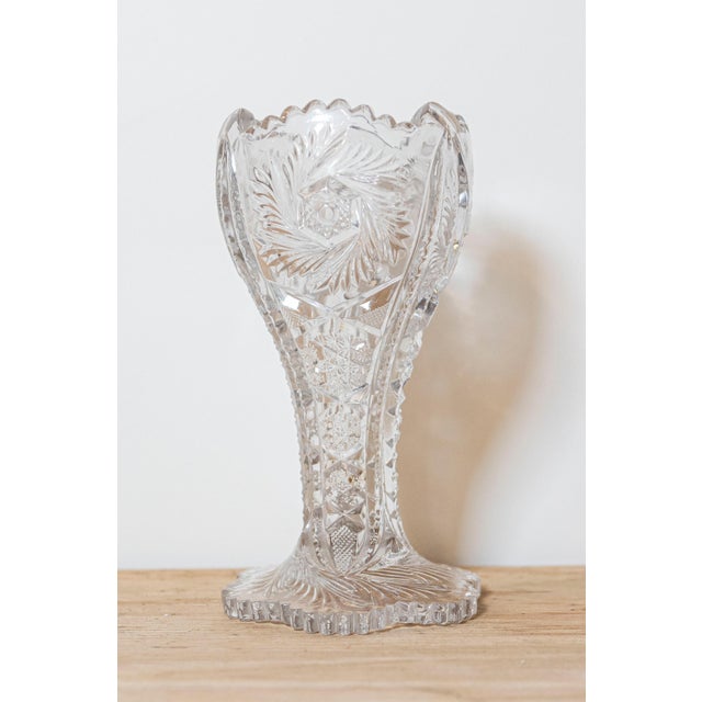 An exquisite example of American Brilliant Period cut glass, this flared trumpet vase dazzles with its intricate geometric...
