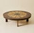Coffee table by Roger Capron, produced in the 1960s. The circular top features Capron’s characteristic ceramic tile work...