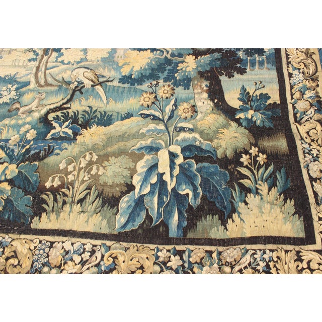 17th Century Antique Tapestry With Woodland Scene and Floral Border in Blue Tone For Sale - Image 9 of 11