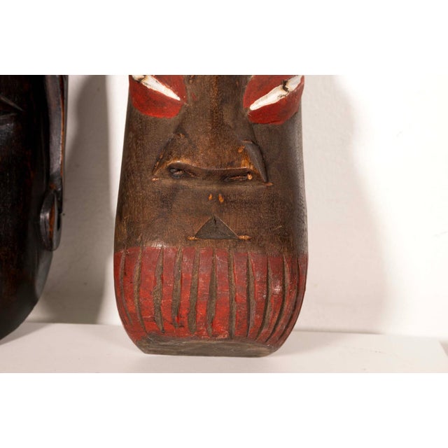 Late 20th Century Pair of Vintage African Tribal Hand Carved & Painted Wooden Mask With Feathers For Sale - Image 5 of 7