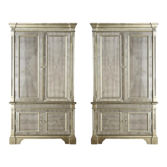 Armoire - the ogee molded cornice over fluted frieze above two long over two short doors with inset mirror plates framed...