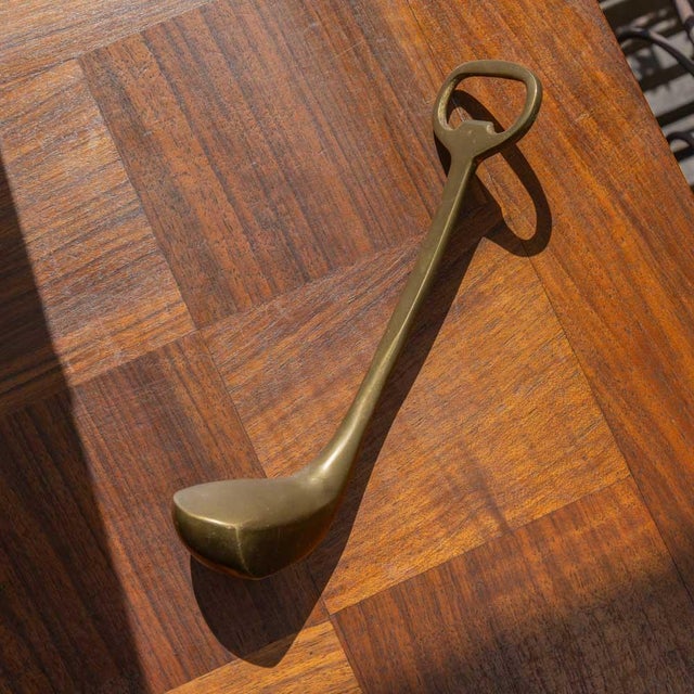 Unique vintage solid brass golf club bottle opener from France, 1950s. Beautiful etched brass with intricate details and...