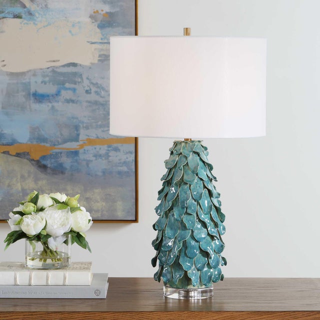 The Mina Table Lamp Showcases A Ceramic Base Meticulously Formed With Individual, Flowing Leaves, Finished With A...