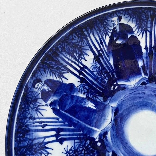 Extraordinary Japanese porcelain Imari plate from Japan, early 1900s. Six characters are depicted in a bamboo forest. The...