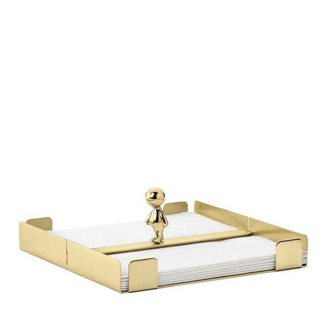 Part of the Omini Collection, this brass napkin tray is distinguished for its geometric silhouette and whimsical design....