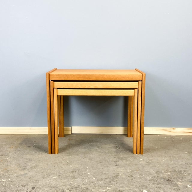 Minimalist set of three tiered side tables, crafted with the typical perfection of Danish mid-century design. The clean...