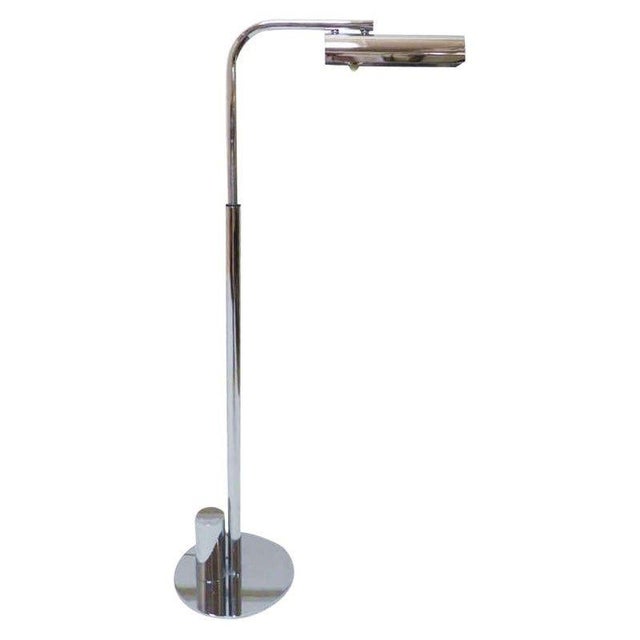Chrome-plated steel reading lamp from the Ball Line designed in 1965 by Charles Hollis Jones. The Lamp features an actual...