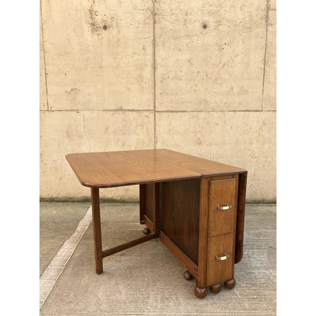 1940's Unique large Oak drop leaf dining table / desk with long drawers English antique folding dining table from 1940's...