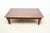Coffee Table by Ralph Lauren. Store item #528. It features carved mahogany wood aproned sides.
