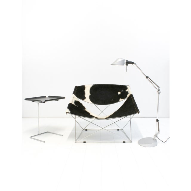The F675 als known as the Butterfly Chair was designed by Pierre Paulin in 1963 and manufactured by Artifort, Holland....