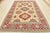 This traditional tribal geometric Caucasian Kazak rug is hand-knotted with an all-wool pile on a cotton foundation. This...