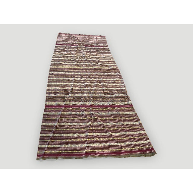 Beautiful antique sarong from Sumatra. There are so many uses for this soft cotton handwoven textile. This sarong is sewn...