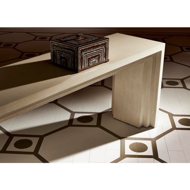 Contemporary mahogany console table in antique white.Corey Damen Jenkins Collection.