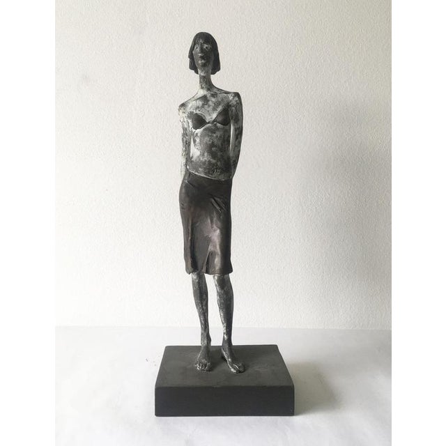 This intense bronze sculpture was made by the well known Italian artist, Aron Demetz, in 2004, Italy. This is a lost wax...