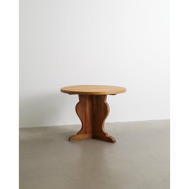 A very rare and early Swedish mid century modern "Lovö" side / console center table with a traditionally sculptural base...