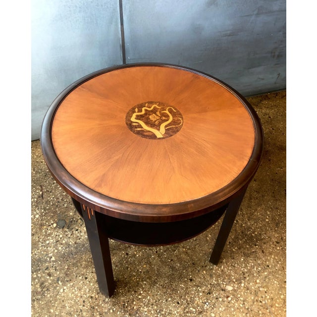Swedish Grace style Scandinavian site table. Stained wood with inlay on table top. Circa 1930th. Recently refinished.