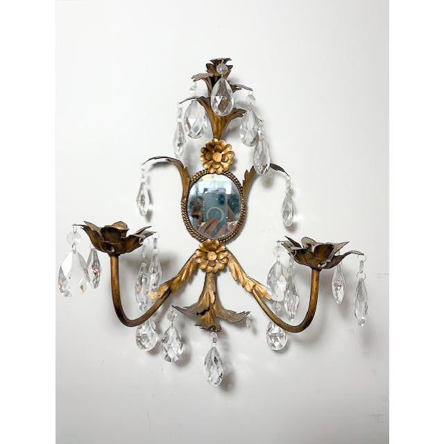 Darling Vintage Italian tole two-light sconces with teardrop crystal accents. Adorned with a leaf motif to create bases...