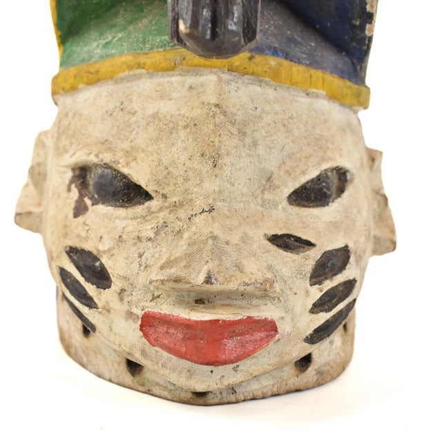 The Gelede mask, originating from the Yoruba people living along the southwestern Nigerian and Beninese border, showcases...