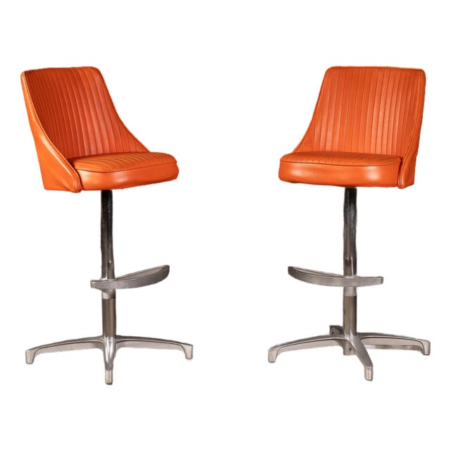 Pair of MCM Orange Vinyl Swivel Chairs by Chromcraft For Sale