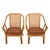 A stylish pair of Mid-Century bamboo and cane side chairs that bring an easy coastal elegance to any space. The sculptural...