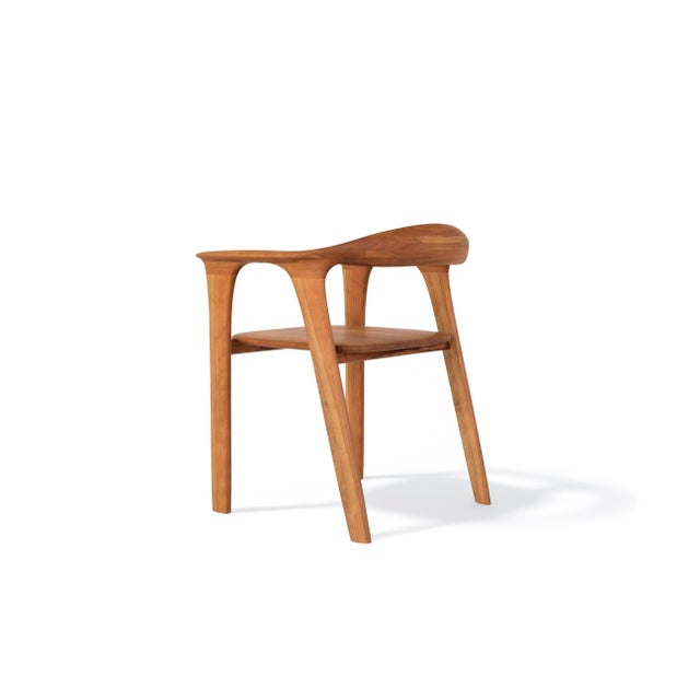 "Trovante" is a solid wood chair characterized by a soft, organic form that finds inspiration in nature. A chair that...