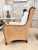 The Kingston Wing Chair has a hardwood frame and tapered legs with a warm natural finish, accented by sculptural natural...