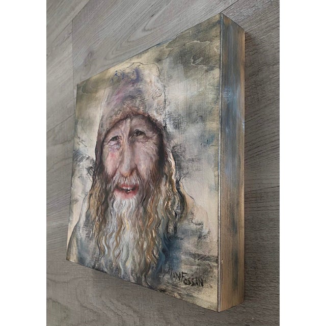 This artwork presents a close-up portrait of an older man, characterized by deep-set eyes and a warm, inviting smile. The...