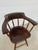 Enjoy this vintage Windsor inspired pub style captain’s chair! This chair features a solid wood construction with a curved...