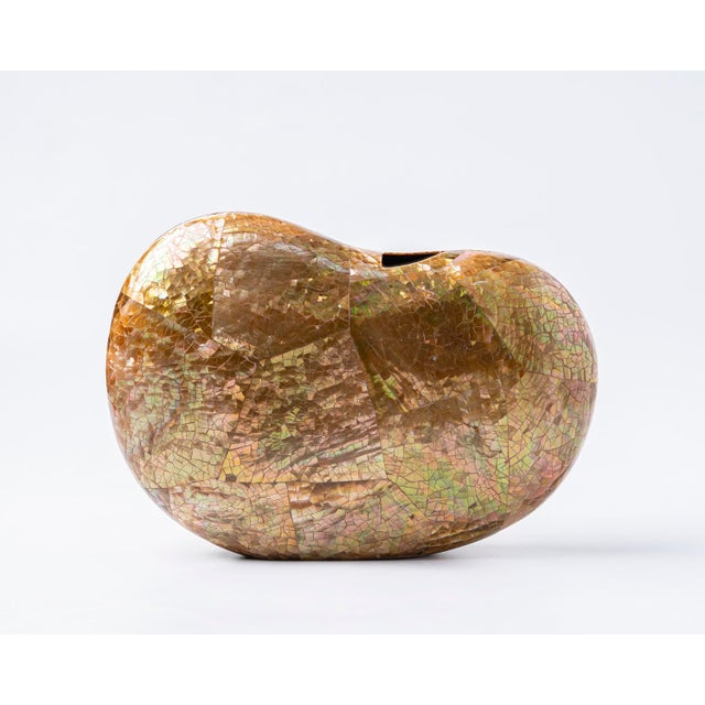 Inspired by the softly rounded silhouette of a kidney bean, the LUCIA Bean Minaudière is an elegant study in form and...