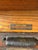 An early 20th century printer's wooden cabinet by Hamilton Manufacturing Company in Two Rivers, Wisconsin with 24 wooden...