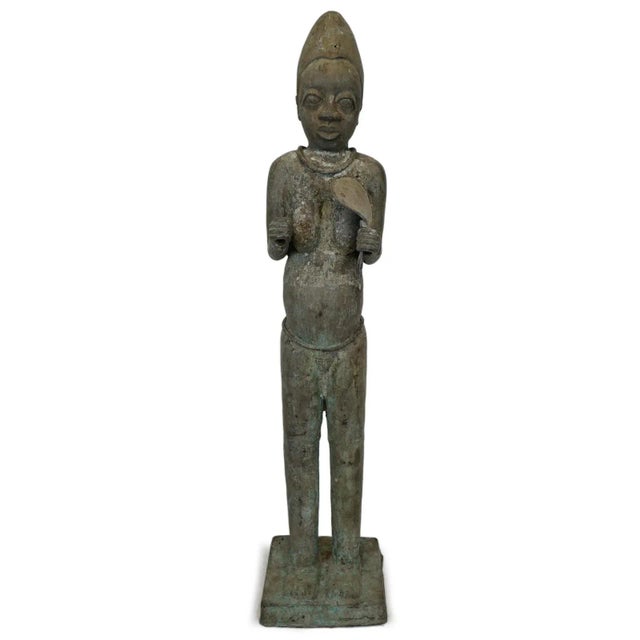 Beautiful and rare bronze Nupe female figure from the Idah region of Nigeria. Traditional elongated head shape with fine...