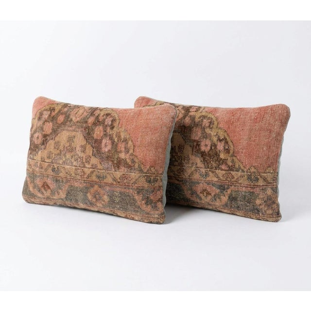 This beautiful 16'' x 24'' pillow cover set was made from authentic Turkish rug pieces. Bright colors of wool adorn the...