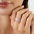 This Blush Horizon band ring is crafted in 925 sterling silver and features rows of baguette-cut pink sapphires in a bold,...