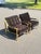 A pair by ‘Worlds Away’ used for staging. Gold leaf frame with black tufted velvet cushions. Highly comfortable, really...