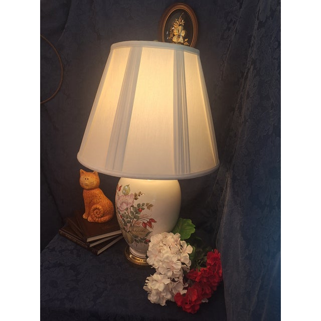 This Vintage Floral Table Lamp is reminiscent of Andrea by Sadek and Frederick Cooper Designs. This classic piece features...