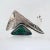 An exceptional mid-century modern Ed Wiener sterling silver and malachite brooch. We believe this to be an early version...