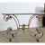 A dramatic French marble and ironwork table from the 18th century, which was used to display current offerings in a...