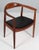 Hans j. Wegner armchair "the chair" in oiled walnut. New upholstered with black full-grain leather. Model pp-503, made by...