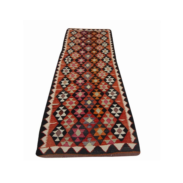 Vintage decorative handwoven kilim runner from South Eastern Turkey.Approximately 45-55 years old. In very good condition.