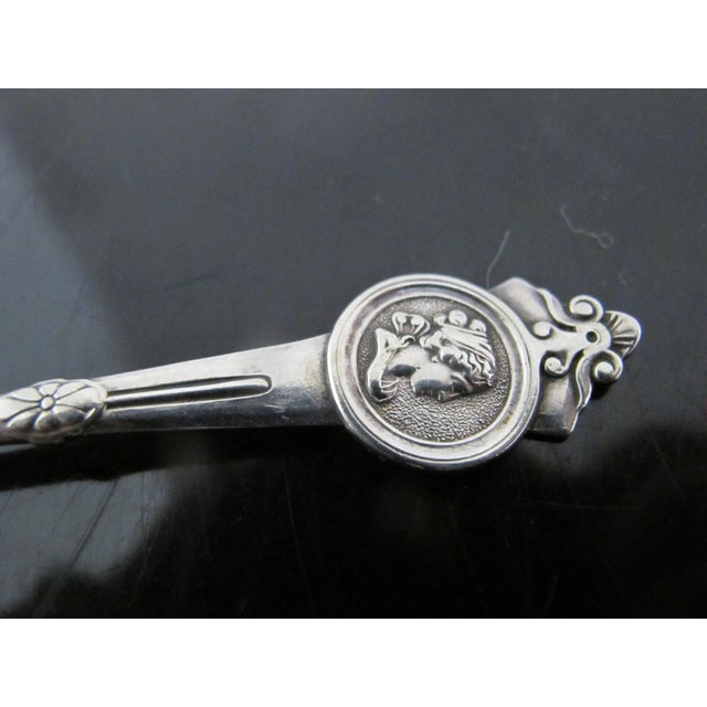 Antique Gorham sterling silver master salt spoon in Medallion 1864 pattern. Measures 3.75" and weighs 9 grams. Excellent...