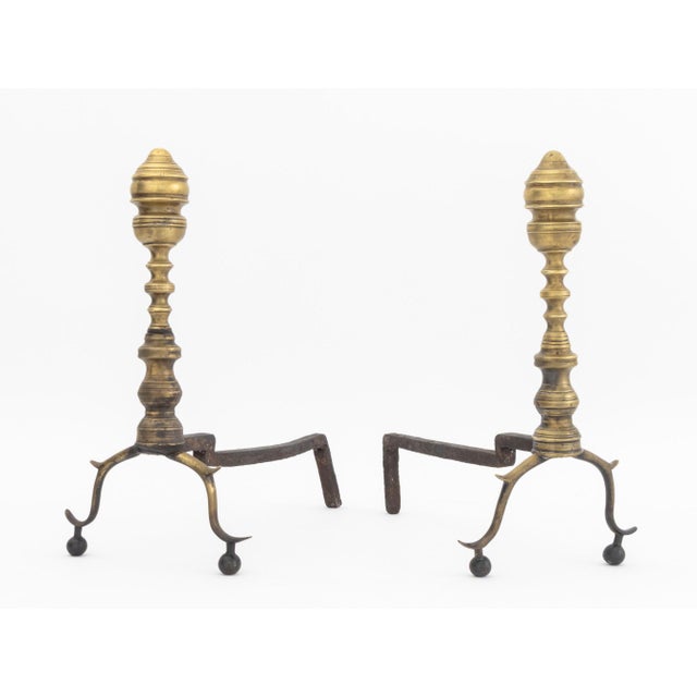 Pair of Federal Style Brass Andirons. 16.75" H x 14.75" W x 8.5" D. Provenance: From a Sutton Place Collection.
