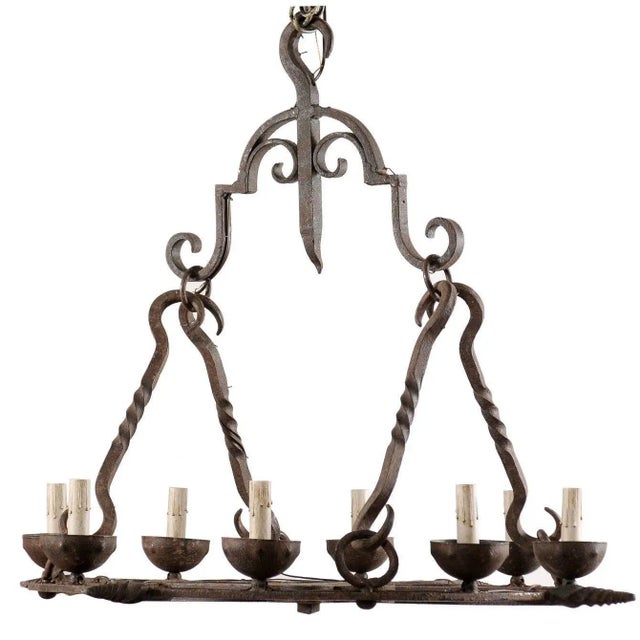 French Mid-Century Eight-Light Forged Iron Chandelier With Hooks and Scrolls For Sale - Image 9 of 9