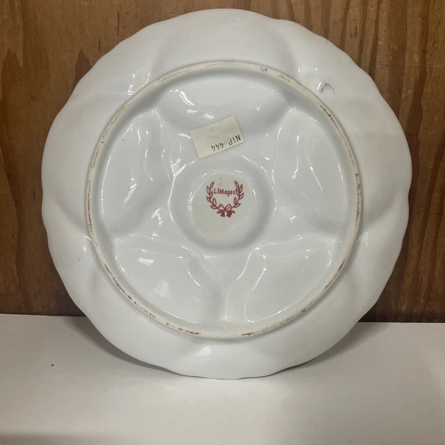 Beautiful antique oyster plate crafted from fine Limoges porcelain, known worldwide for its exceptional quality and...