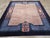 This mid-20th century Chinese Art Deco rug, measuring 10' 0" x 11' 8", showcases a refined and sophisticated design that...