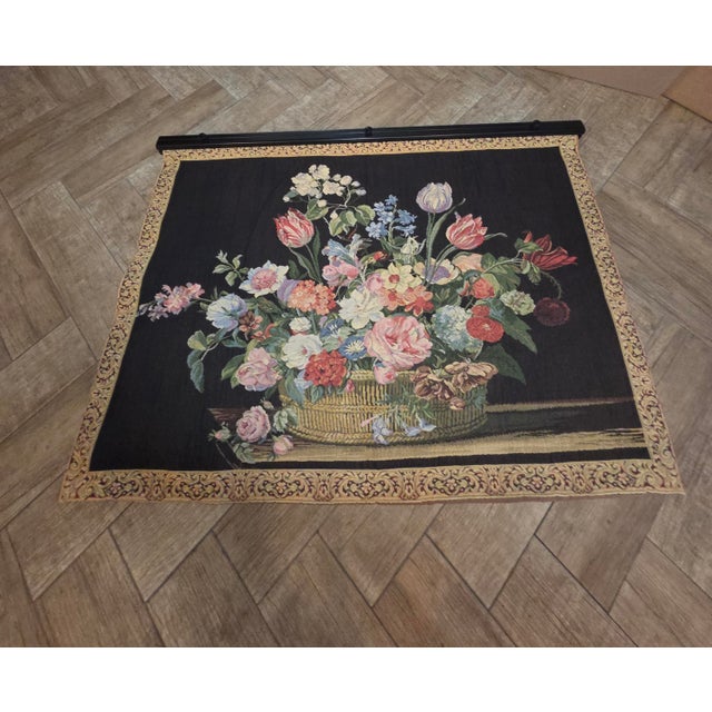 Decorative machine made textile tapestry wall decor features a big basket overflowing with beautiful flowers. This is...