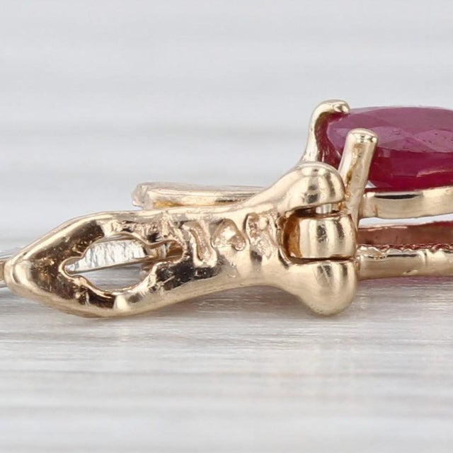 Gemstone Information: - Natural Rubies - Total Carats - 6.50ctw Cut - Oval Color - Red Treatment - Routinely Enhanced...