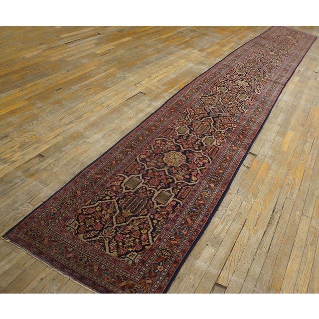 Antique Persian Sarouk rug, size: 2' 7'' x 19' 0''.