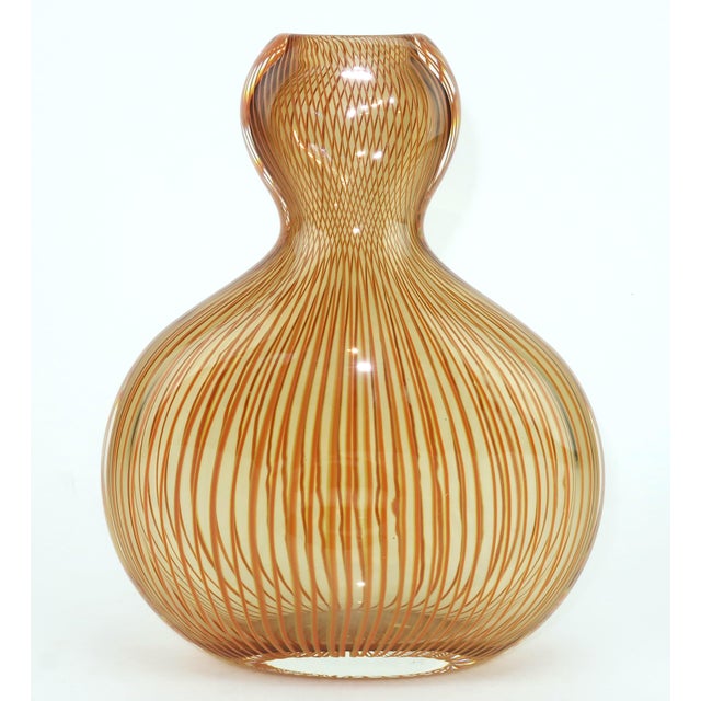 New York based artist Peter Secrest (b.1951) combines modernist art glass with an op art aesthetic to create this handsome...